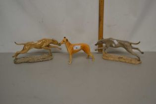 A Beswick model of a greyhound together with two others (3)