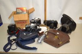 Mixed Lot: A Zenit EM camera together with a Praktica MTL5 camera, various handbags, camera
