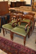 A set of four Victorian mahogany dining chairs together with similarly upholstered footstool (5)