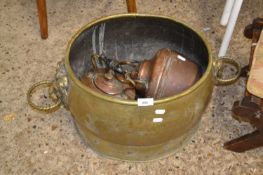 Two copper kettles and an oval brass jardiniere with lion mask handles