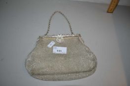 Mesh work evening bag with paste decoration