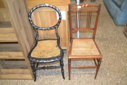 A Victorian mother of pearl inlaid bedroom chair together with a further cane seated chair (2)