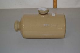 A stone ware hot water bottle