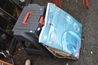 A plastic combination step and tool box together with a garden tidy set