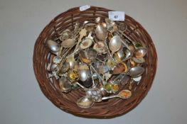 A basket of various collectors spoons