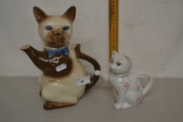 Two cat shaped novelty teapots