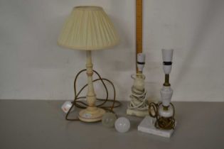 Two marble base table lamps and one other (3)