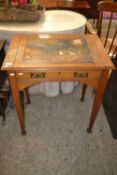 A Stones Patent oak writing table