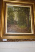 Figures on a path in woodland, oil on canvas, gilt frame