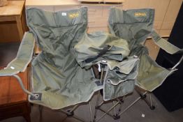 A pair of folding camping chairs