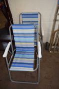 Pair of striped folding garden chairs