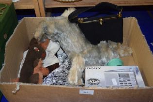 Box of assorted items, toy rabbit, radio etc