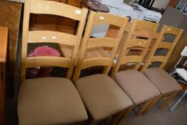 Set of four ladder back dining chairs