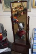 A cheval mirror on stand