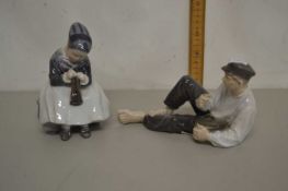Royal Copenhagen model of a recumbent gentleman together with a model of a seated girl (2)