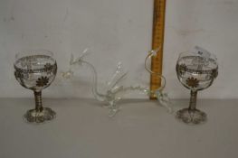 A glass dragon together with a pair of Cypriot wine glasses (3)