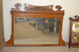 Late Victorian American walnut framed over mantel mirror