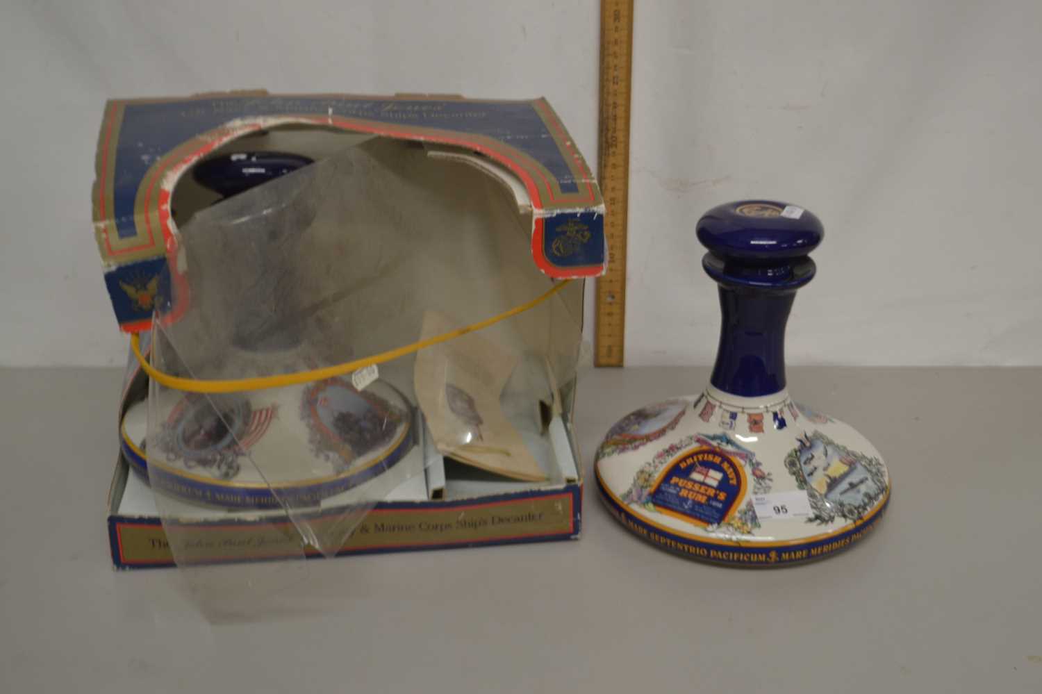 Two large British Navy Pussers Rum decanters (opened)