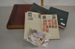 Collection of albums of various world stamps together with a Wedgewood plate
