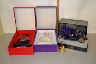 A Limoges porcelain Larsen Cognac of the Vikings boxed decanters, one with contents the other