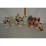 Group of various small Staffordshire spill vases, spaniels, a further Parion ware figure, various