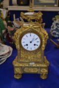 A French ormolu cased mantel clock with brass movement, striking on a bell, marked CV, movement