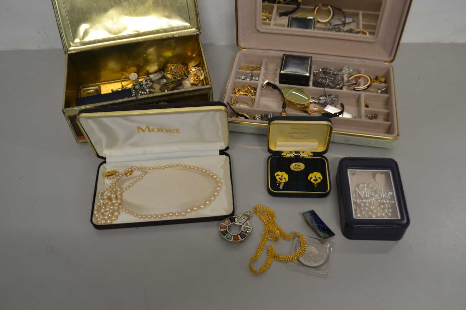 Three cases of various assorted costume jewellery