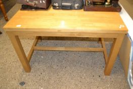 A pine topped kitchen table