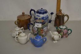 Collection of various small Oriental and other teapots