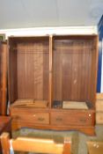 Late Victorian American walnut wardrobe with drawers to base