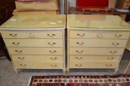A pair of mid Century continental style cream finish five drawer bedroom chests