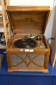 An oak cased gramophone by His Masters Voice (HMV)