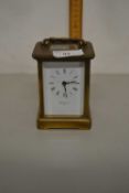 Small brass cased carriage clock