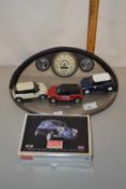Mini Cooper Interest - A collection of small model cars by Corgi and an accompanying dashboard