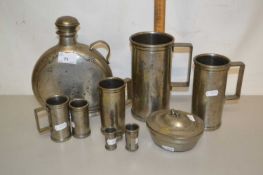 Collection of various pewter measures and other items
