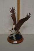 Franklin porcelain model of a Bald Eagle on wooden base