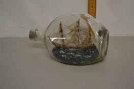 Glass ship in a bottle
