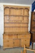 Victorian and later pine dresser with serpentine base, 135cm wide