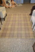 Modern tartan style floor rug