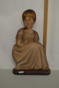 Painted cut out figural board formed as a young girl