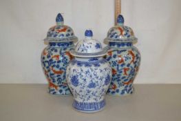 Pair of reproduction Chinese vases decorated with goldfish together with one other (3)