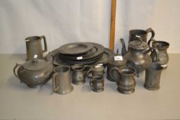 Mixed Lot: Various pewter wares to include a range of tankards, warming plates, tea wares etc