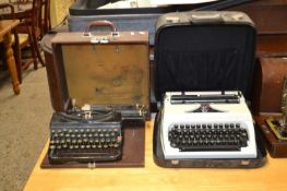Two cased typewriters, a Remington Portable Model 5 and an Erika (2)
