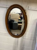 Oak framed oval wall mirror