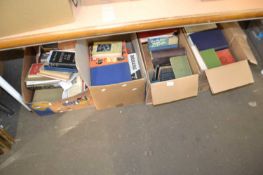 Four boxes of assorted books, various topics