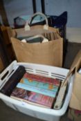 Four boxes of assorted books to include hardback and paperback fiction and others, together with a