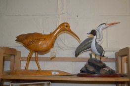 An ash carving of a curlew by Albert King together with two other bird figurines (3)