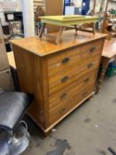 An Edwardian chest of drawers of two short over three long