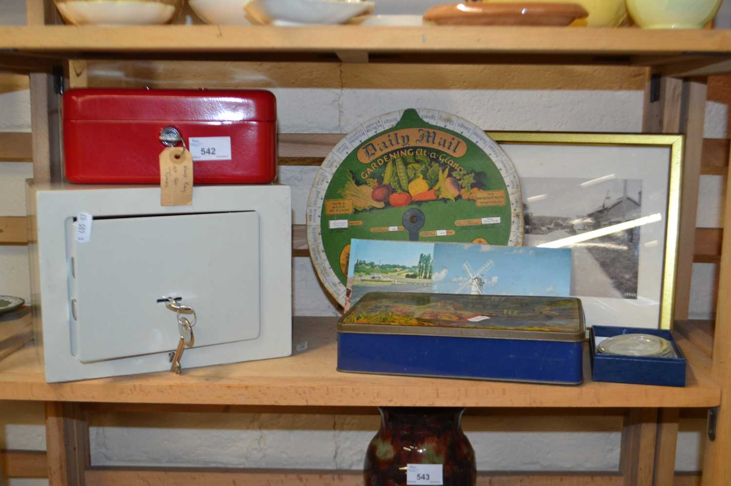 A small safe, cash box tin, collectors tin and other items