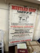 A large Mustard Shop banner on board